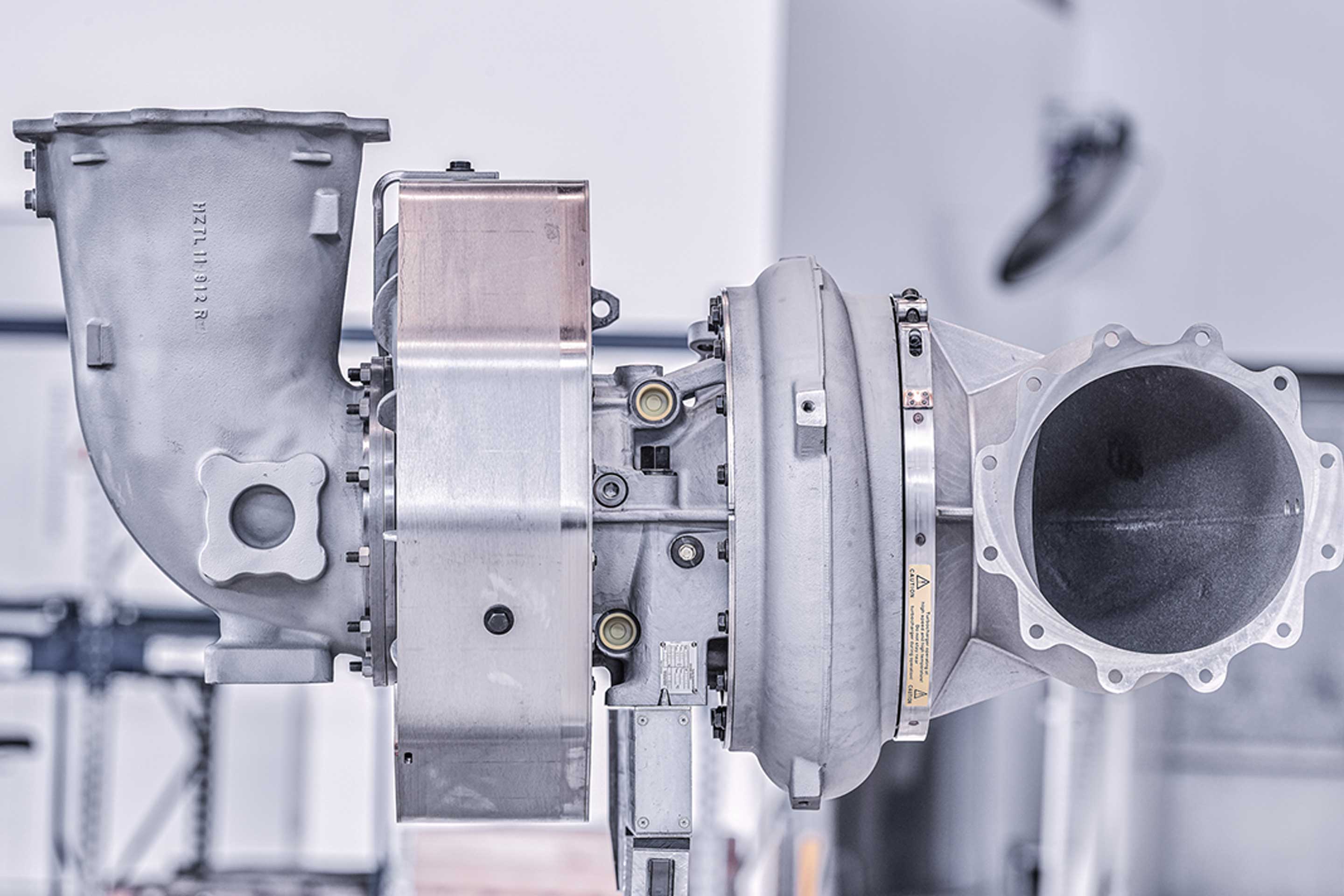 A photo of an Accelleron turbocharger, highlighting an interview with Accelleron's Christophe Rofka