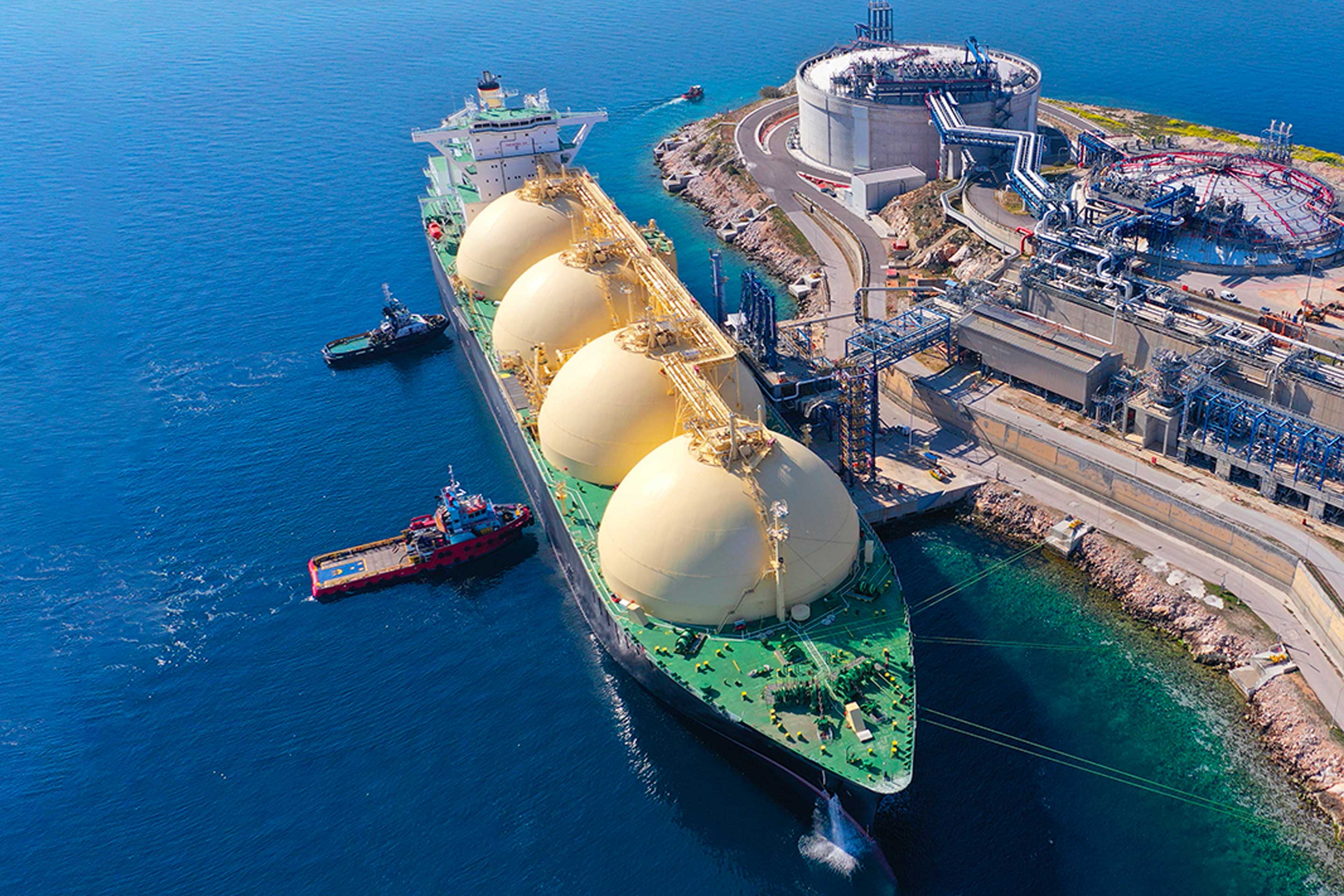 A photo of an LNG carrier anchored in a gas storage terminal